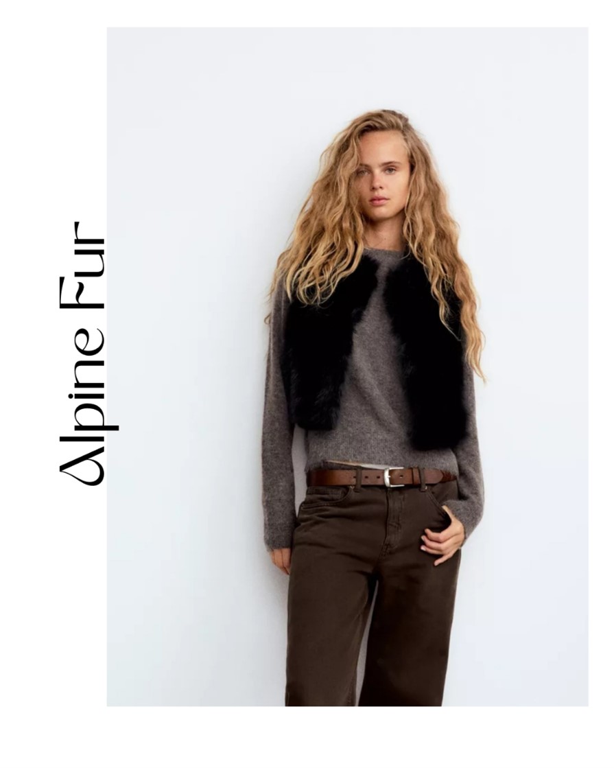 Model wearing pant, sweater and fur bolero